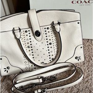 Coach handbag satchel with long shoulder strap. Never used.